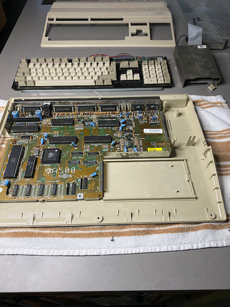 Amiga 500 with case, keyboard, and disk drive removed