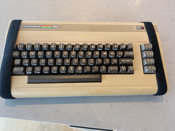 Commodore 64 held together with straps